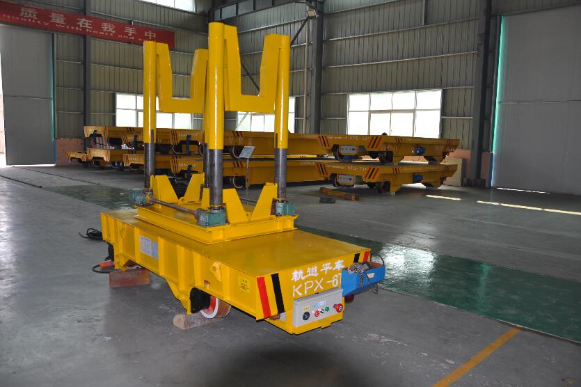 Ladle transport lorry with scale system and tilting device running on turning rail will be manufactured. 